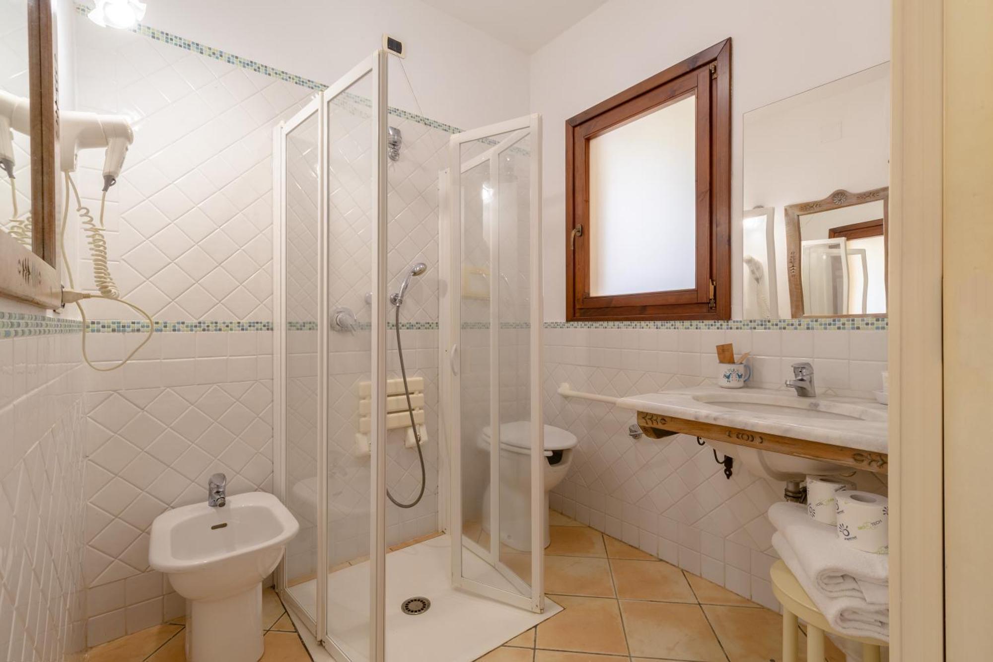 Porto Giunco Residence ヴィッラシミーウス エクステリア 写真