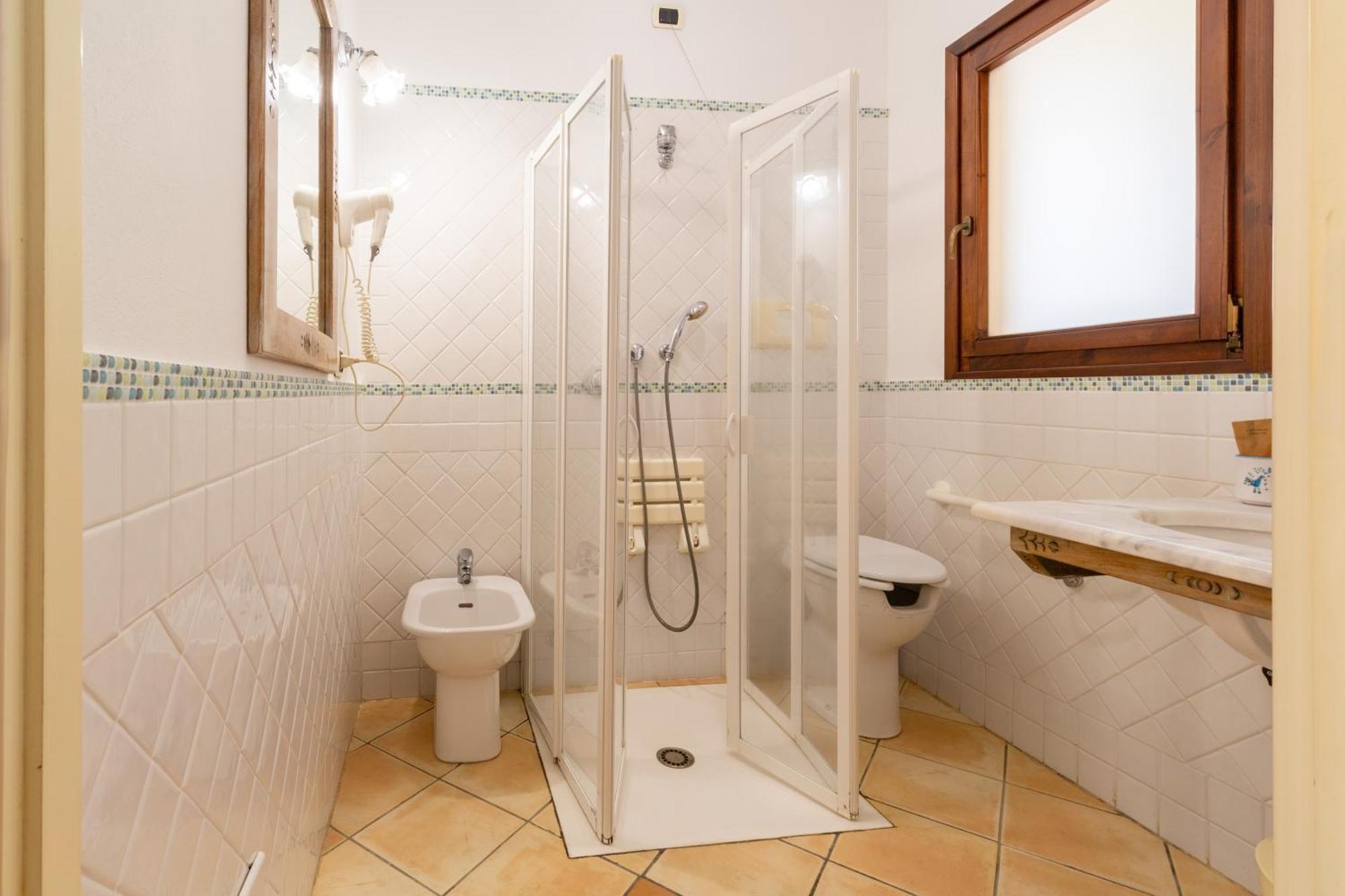 Porto Giunco Residence ヴィッラシミーウス エクステリア 写真