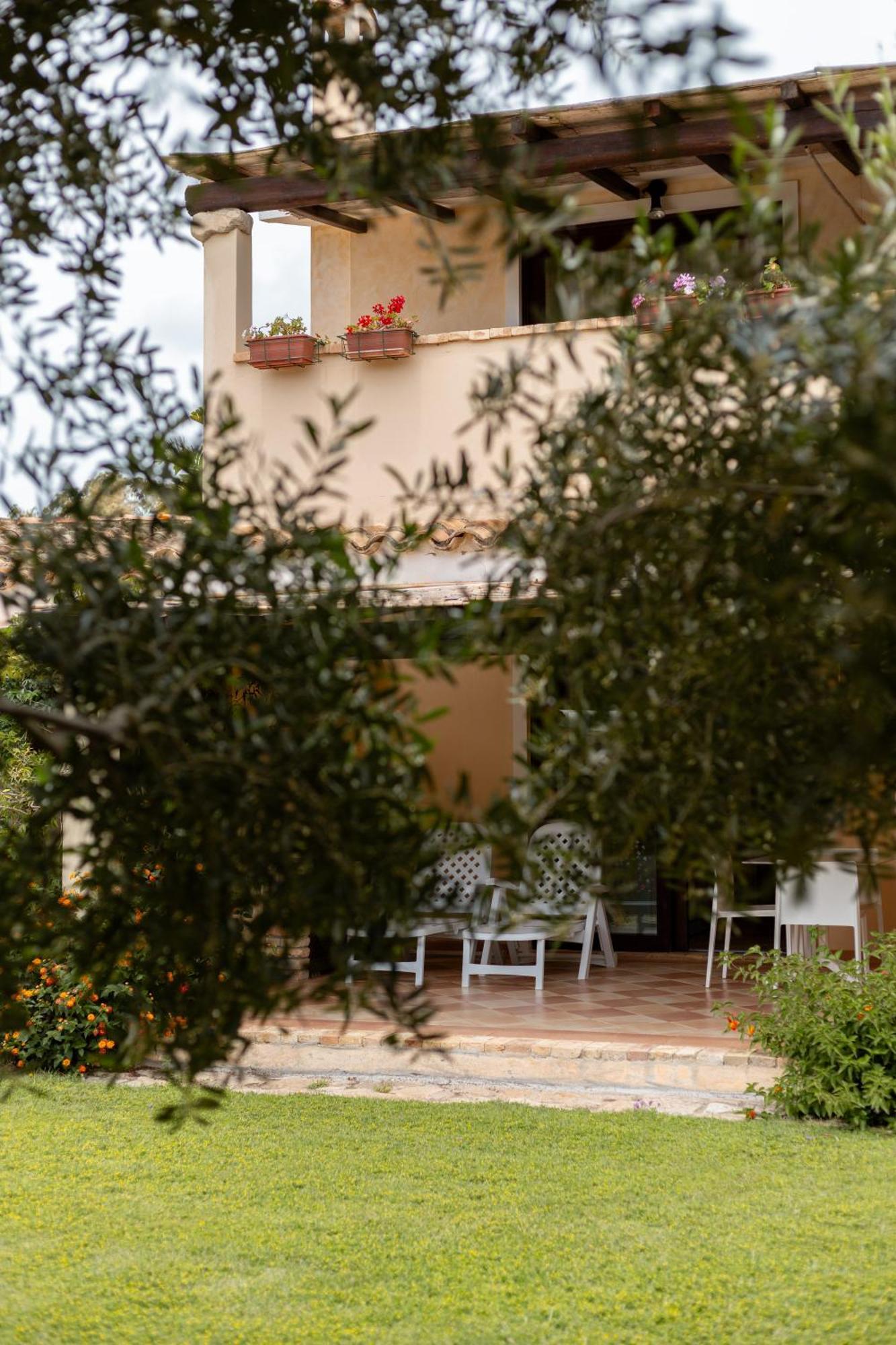 Porto Giunco Residence ヴィッラシミーウス エクステリア 写真