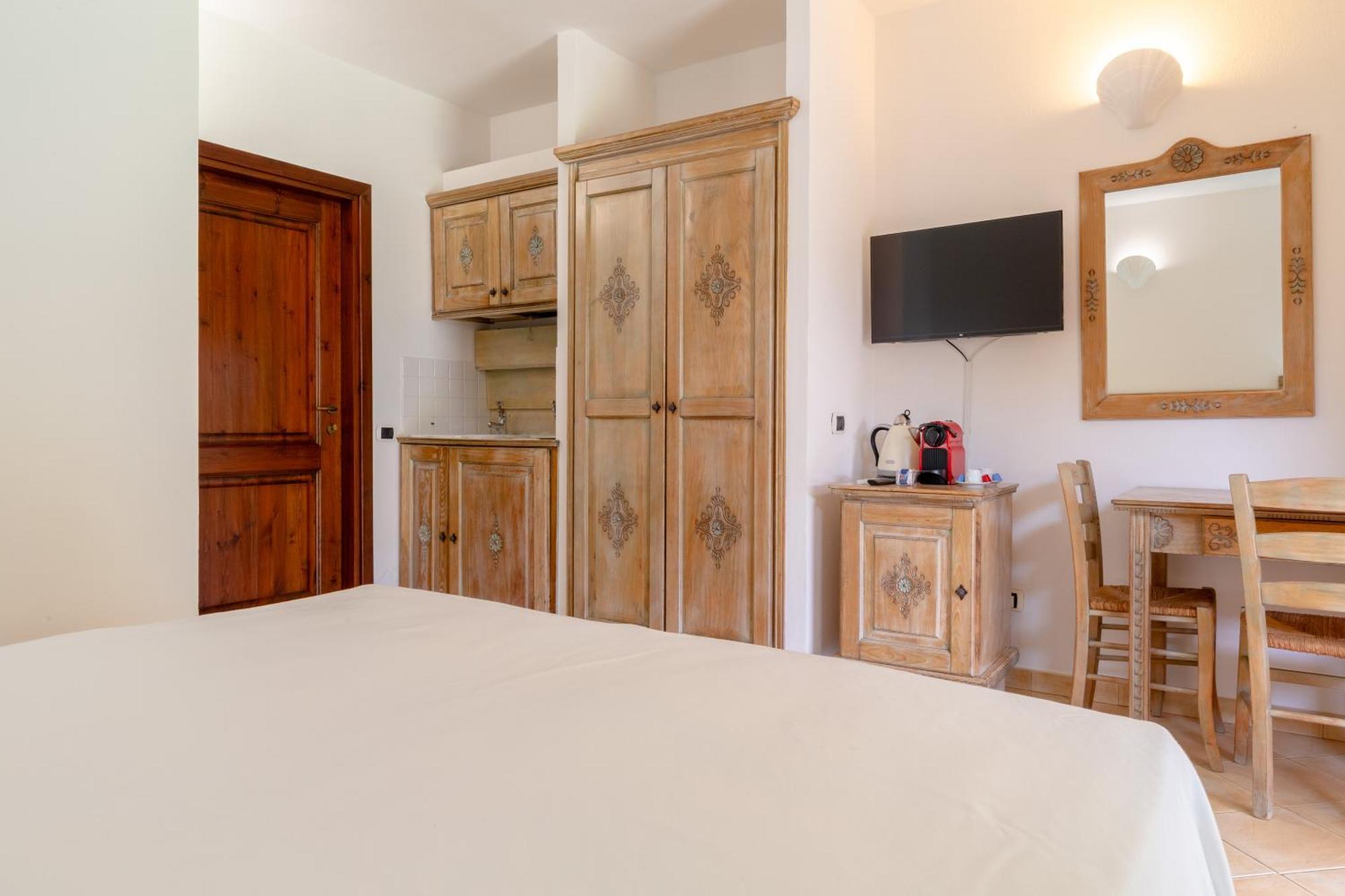 Porto Giunco Residence ヴィッラシミーウス エクステリア 写真