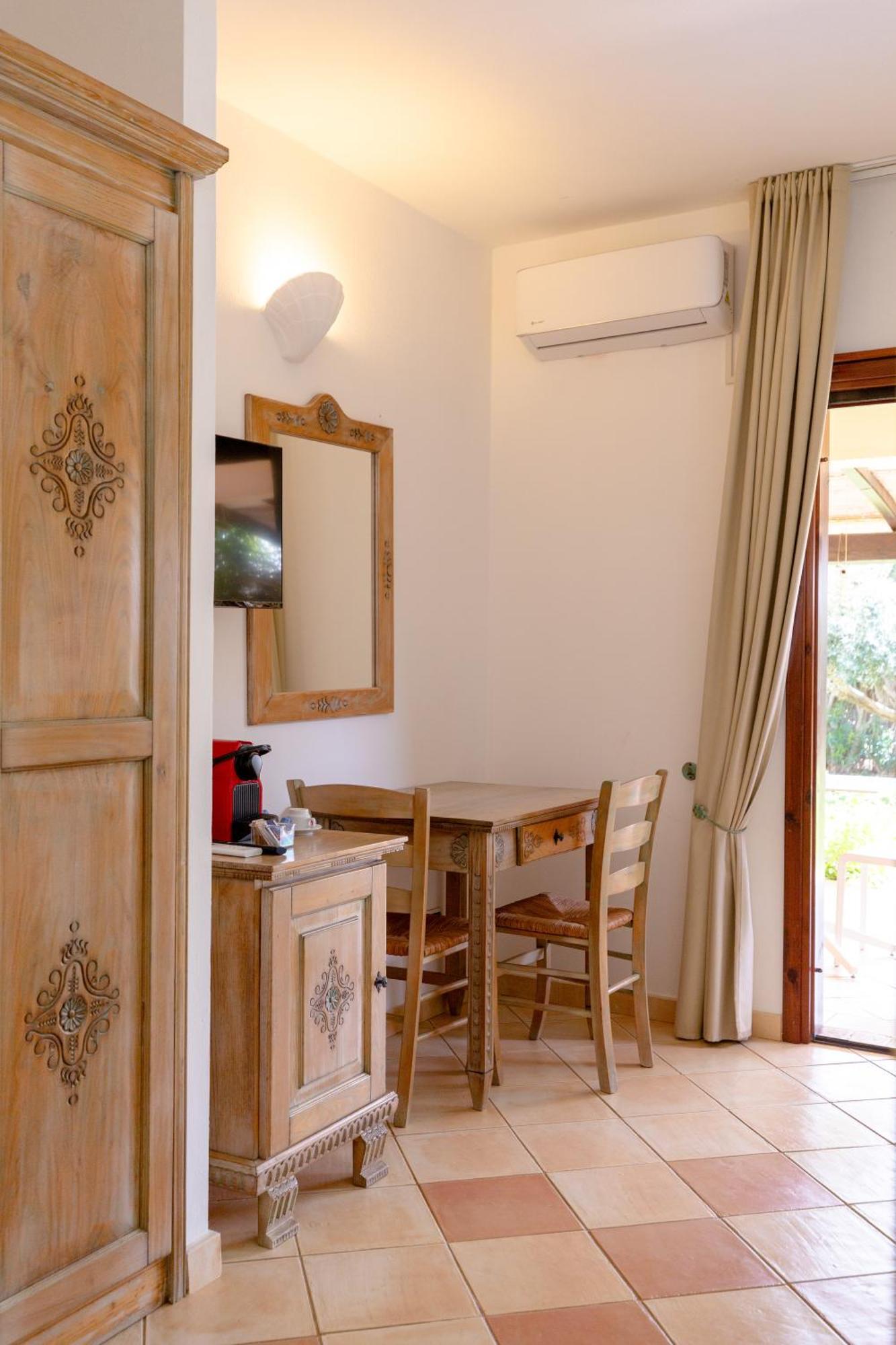 Porto Giunco Residence ヴィッラシミーウス エクステリア 写真