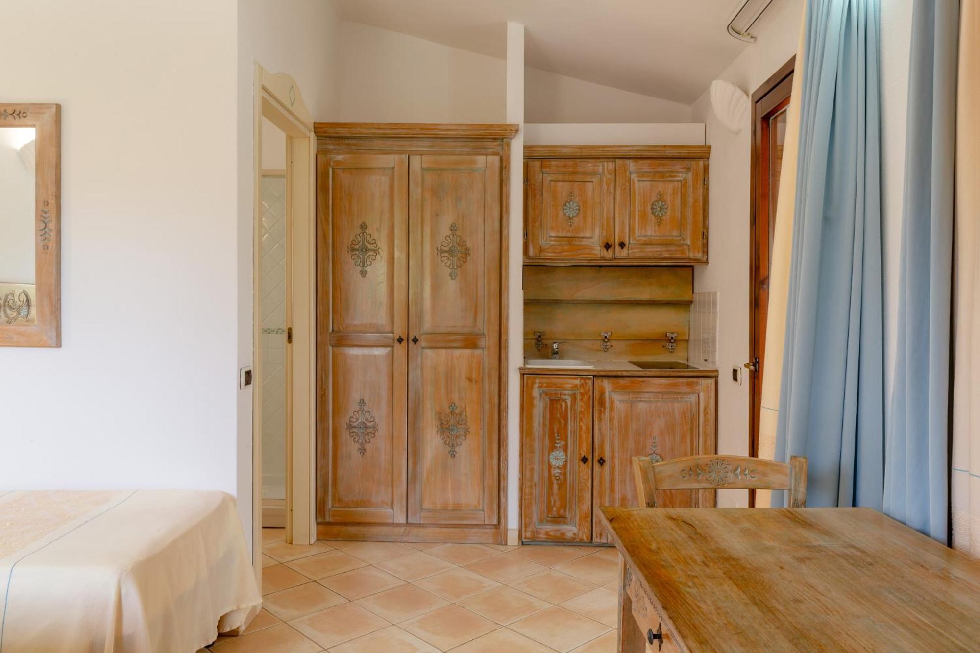 Porto Giunco Residence ヴィッラシミーウス エクステリア 写真
